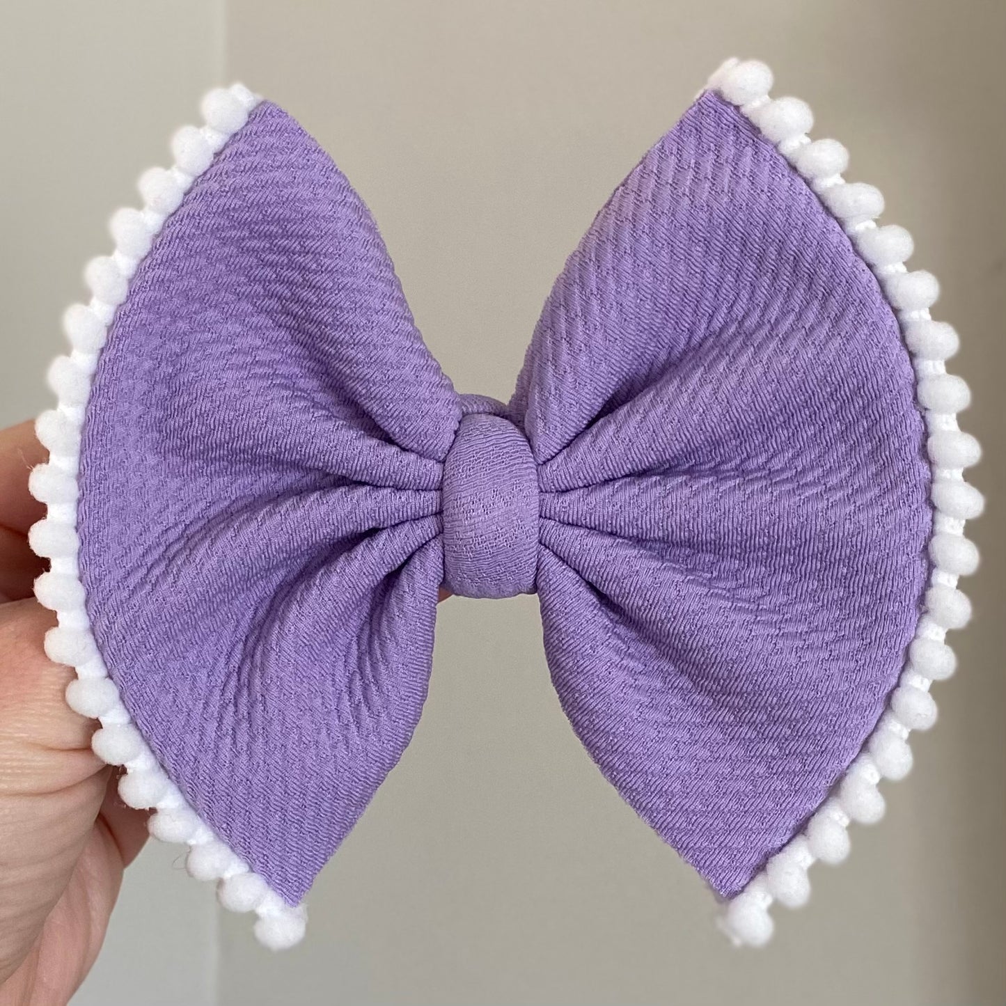 Pom Pom Trimmed Bow
