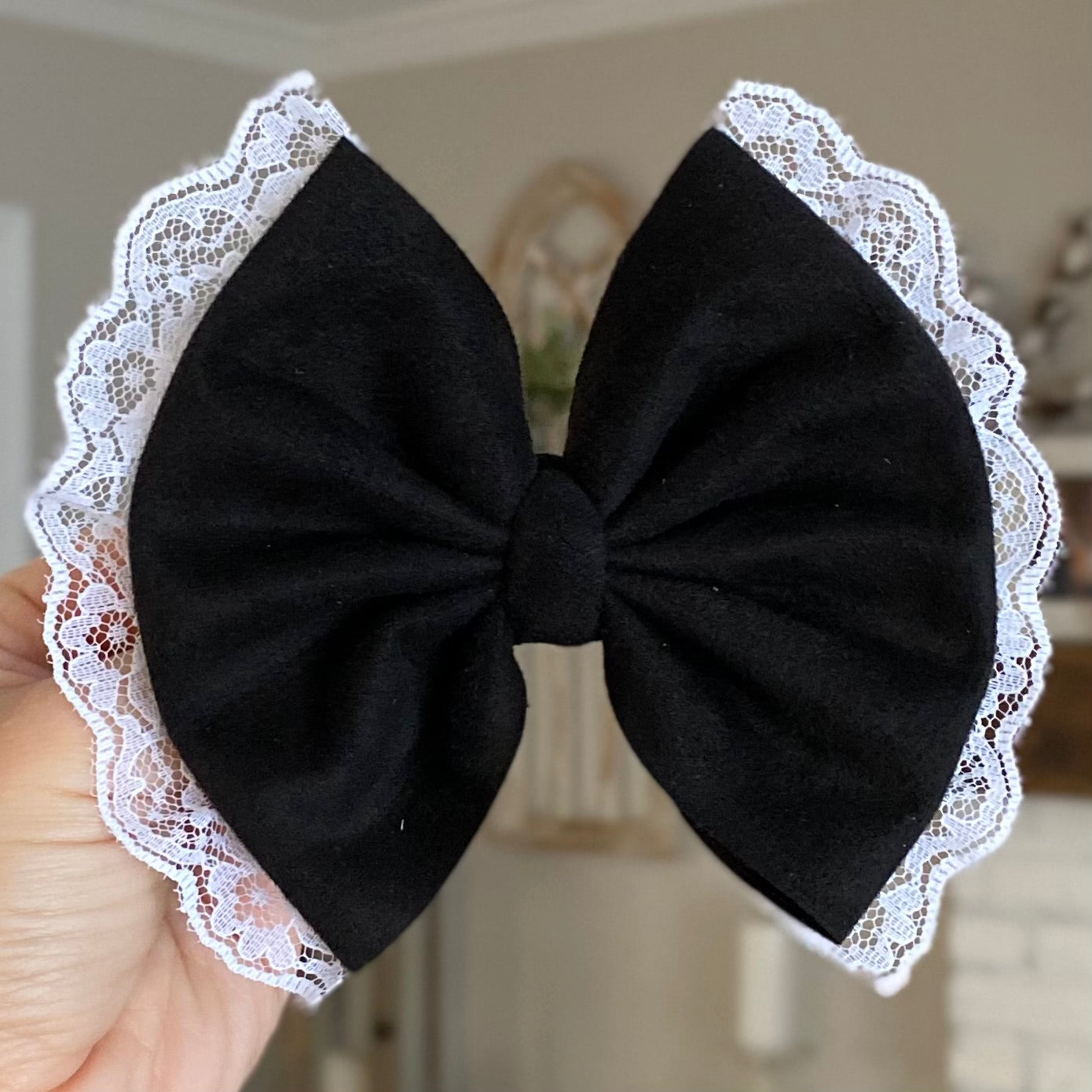 Lace Trimmed Suede Bow
