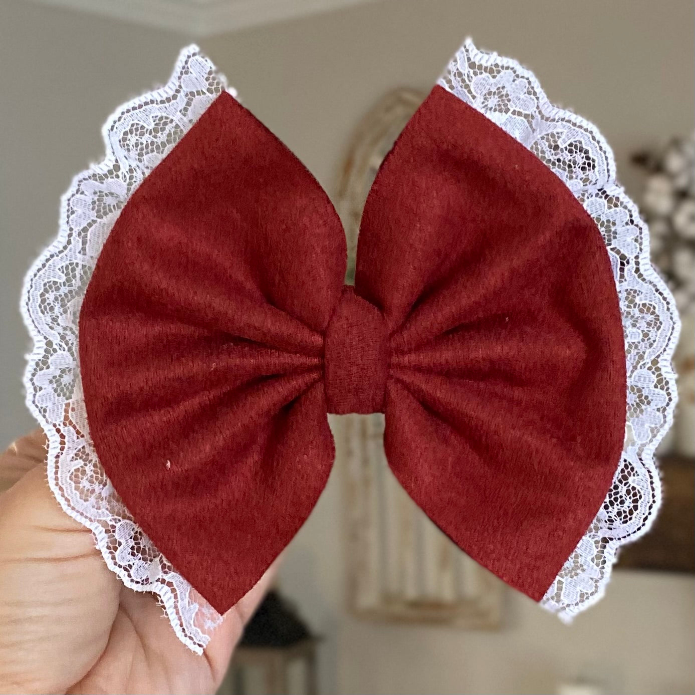 Lace Trimmed Suede Bow