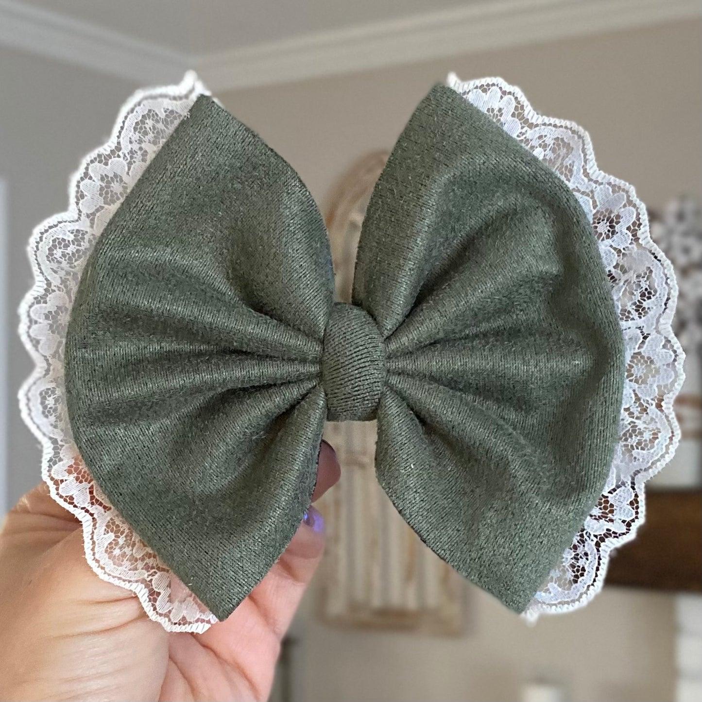 Lace Trimmed Suede Bow