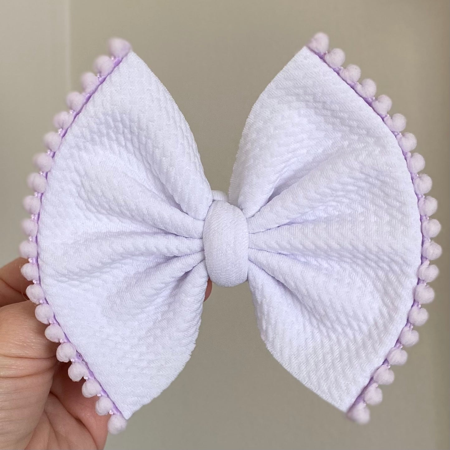 Pom Pom Trimmed Bow