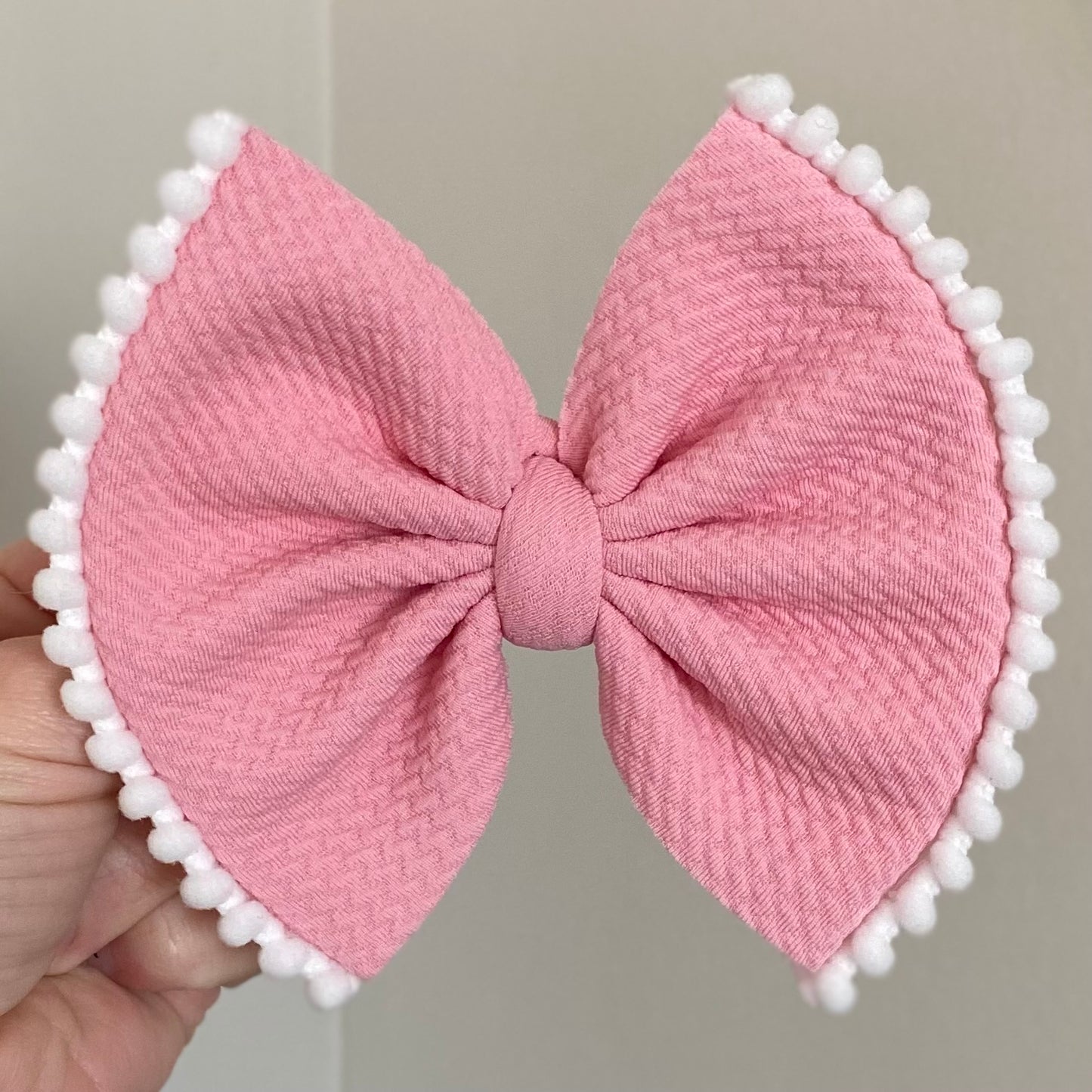 Pom Pom Trimmed Bow
