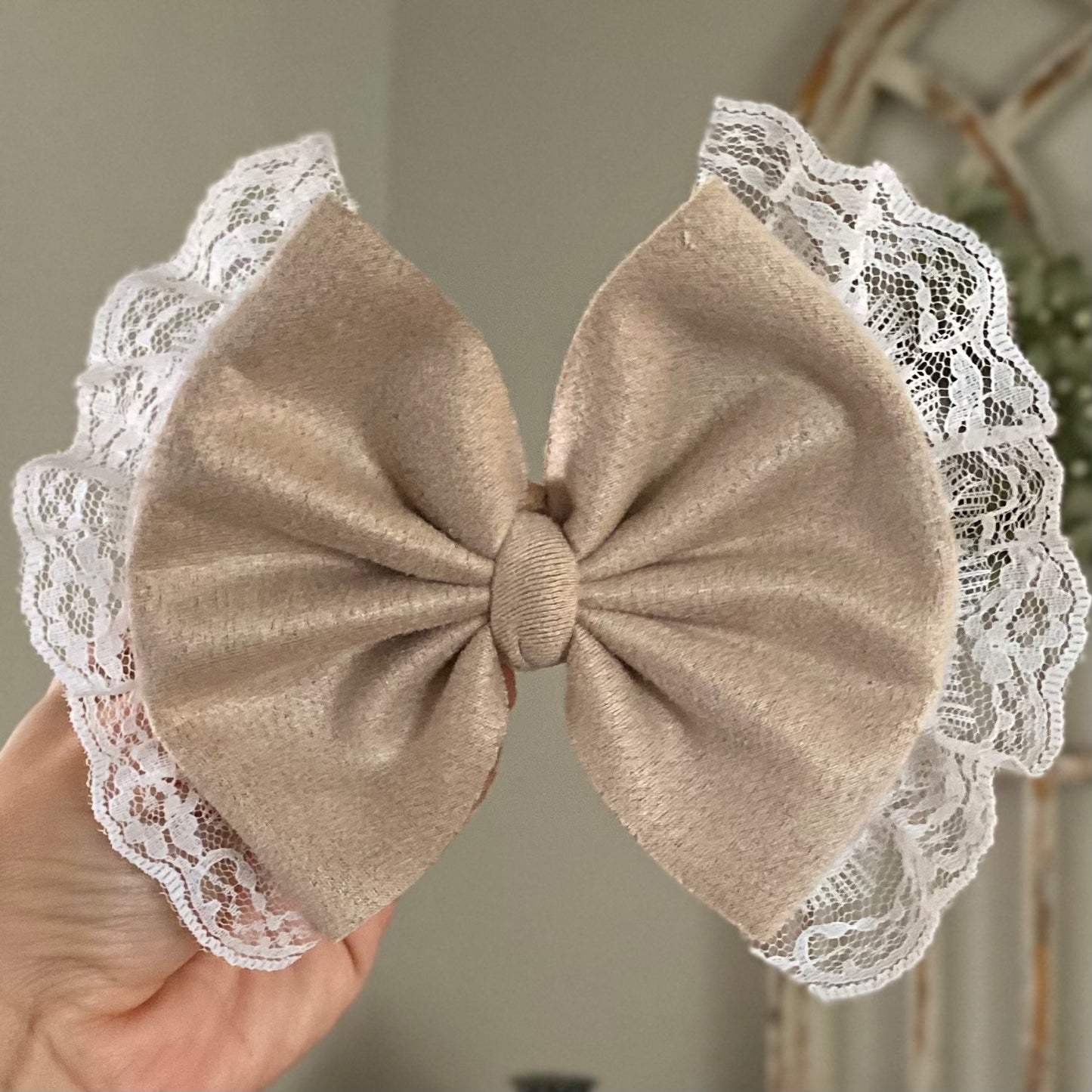 Lace Trimmed Suede Bow